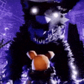 a teddy bear is standing next to a giant monster in a dark room .