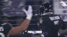 a football game is being played between the ravens and the bears