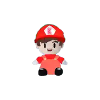a stuffed toy with a red hat and overalls has the letter k on it