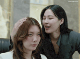 two women are touching each other 's hair with the caption lingormgifss