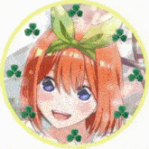 a girl with red hair and blue eyes is smiling in a circle with clovers around her head .