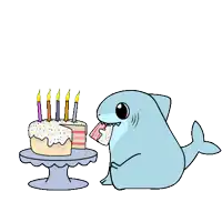 a cartoon shark is sitting next to a birthday cake with candles .