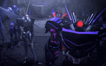 a group of robots are standing next to each other