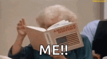 an elderly woman is reading a book about american history and covering her face .