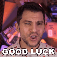 a man with a beard says " good luck "