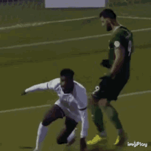 a soccer player in a white jersey with the number 9 on it