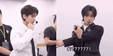 a man in a white shirt and black tie is holding a remote control and says ' ? '