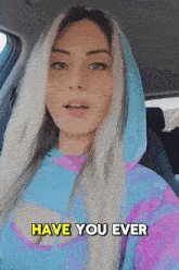 a woman in a car with the words have you ever written on the bottom