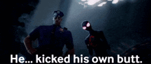 a police officer and a spiderman are standing next to each other with the words hee kicked his own butt on the bottom