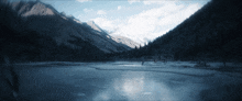 a lake in the middle of a mountain range