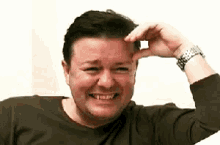 Ricky Gervais Laugh GIF
