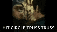 a close up of a monkey looking at a woman 's face with the words `` hit circle truss truss '' .