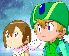 a boy and a girl standing next to each other