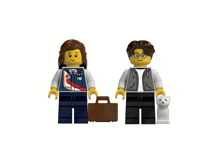 a man and a woman are standing next to each other with a cat and a suitcase
