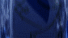 a blurred image of a person 's face in a dark room