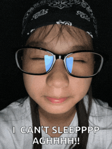 a girl with glasses and a bandana on her head says i can 't sleepppp aghhhh