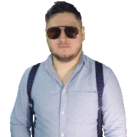 a man wearing suspenders and sunglasses looks to the side