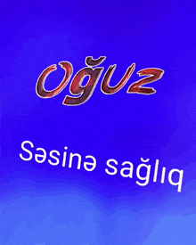 a blue background with the word oguz in red