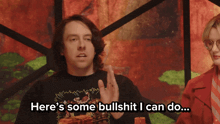 a man says " here 's some bullshit i can do " in front of a woman