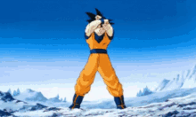 a cartoon character named goku is standing in a snowy field