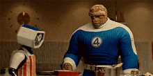 a cartoon character in a fantastic four costume is cooking in a kitchen