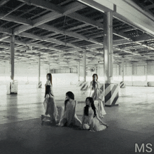 a black and white photo of a group of women with the letters ms above them