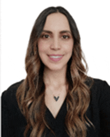 a woman with long hair is wearing a black shirt and a necklace with a v on it .