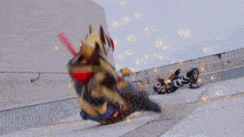 a person in a red and gold costume is laying down