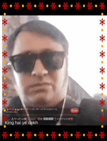 a man wearing sunglasses and ear buds says king hai ye dek