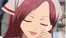 a girl with red hair is wearing a white nurse 's hat and covering her face with her hand .