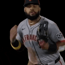 a man with a beard wearing a san francisco uniform