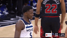 a basketball player with the number 22 on the back of his shirt