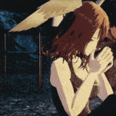 a woman with wings on her head looks down