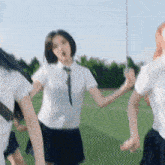 a girl in a white shirt and tie stands in a field