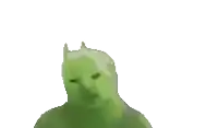 a green cat is laying down and waving its paw