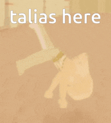 a blurred image of a person with the words " talias here " above them