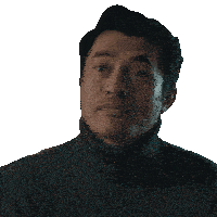 a man wearing a black turtleneck sweater is looking at the camera
