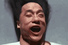 Jackie Chan Wind GIF - Jackie Chan Wind Blow GIFs