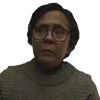 a woman with glasses says what happened