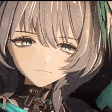 a close up of a anime girl 's face with gray hair and green eyes .