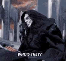 a pixelated image of a man talking on a cell phone and the words who 's they