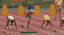 a man in a turban is running on a track with the word wadyyan games on the bottom