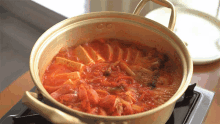 Boiling Stew Two Plaid Aprons GIF