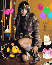 a woman is kneeling down in front of balloons and a birthday cake with a candle on it