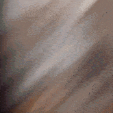 a blurry picture of a person 's face with a few lines visible
