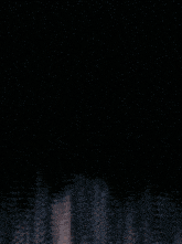 a brick wall with a circle of flames and the words starmaker on the bottom