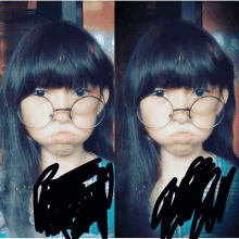 a girl wearing glasses makes a funny face with her mouth open