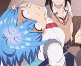a girl with blue hair is making a funny face with her eyes closed