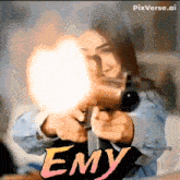 a woman is pointing a gun at the camera with the word enemy behind her