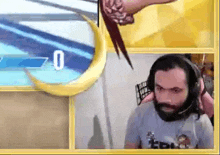 a man with a beard is playing a video game while wearing headphones and a microphone .